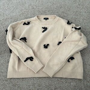 Cream Sweater with Black Bows